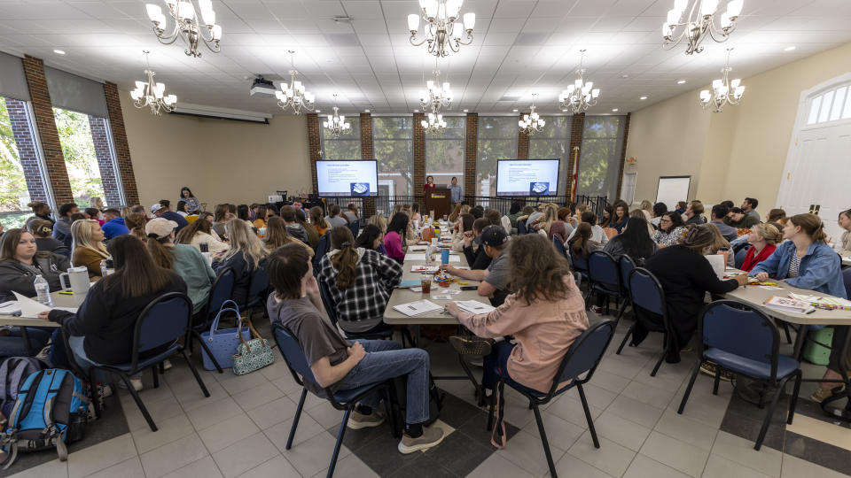 Preservice teachers take an ethics seminar provided by the Athens State college of education, Tuesday, Oct. 11, 2022, in Athens, Ala. The seminar aimed to help prepare prospective teachers for real-world issues in the education workplace. (AP Photo/Vasha Hunt)