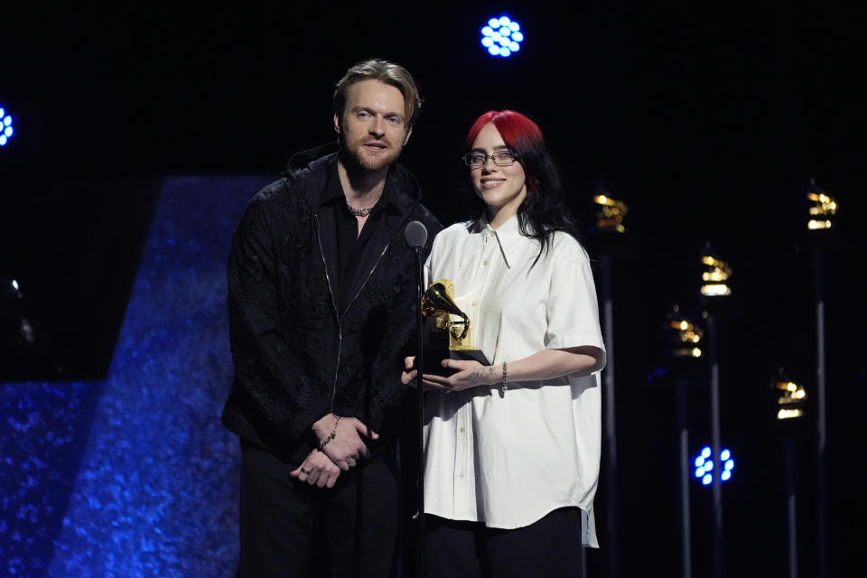 Finneas, left, and Billie Eilish accept the award for best song written for visual media for "What Was I Made For?" from "Barbie" during the 66th annual Grammy Awards on Sunday, Feb. 4, 2024, in Los Angeles. (AP Photo/Chris Pizzello)