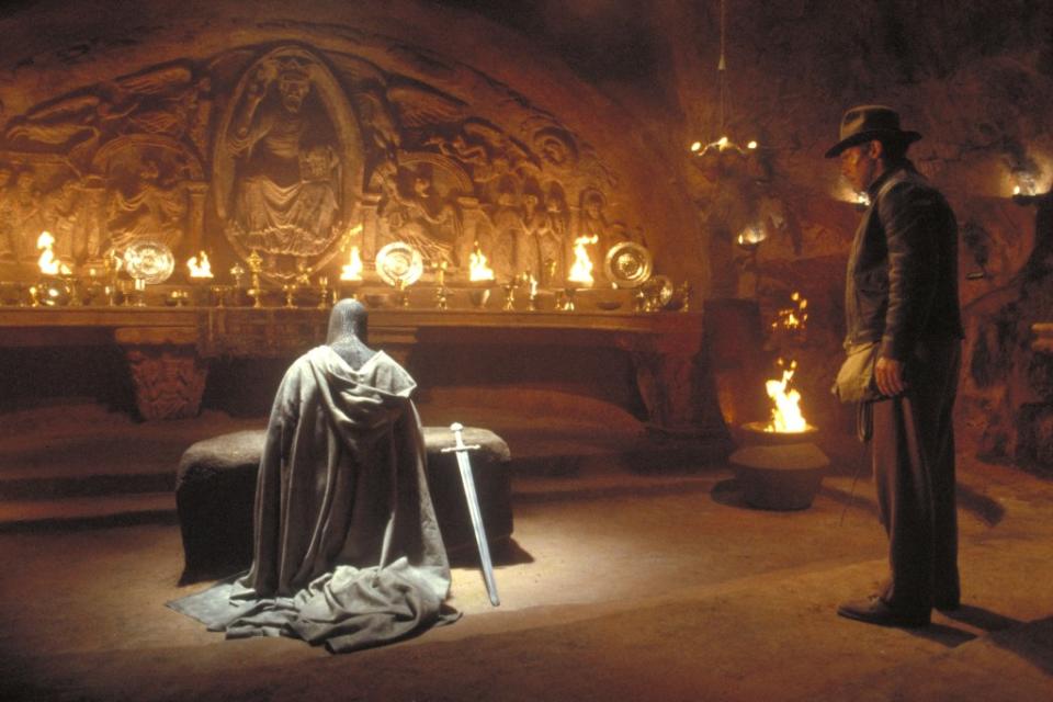 Indiana Jones (Harrison Ford) meets the ancient knight who tells him only one cup out of the many in the scene is the real Holy Grail. Lucasfilm Ltd/Paramount/Kobal/Shutterstock