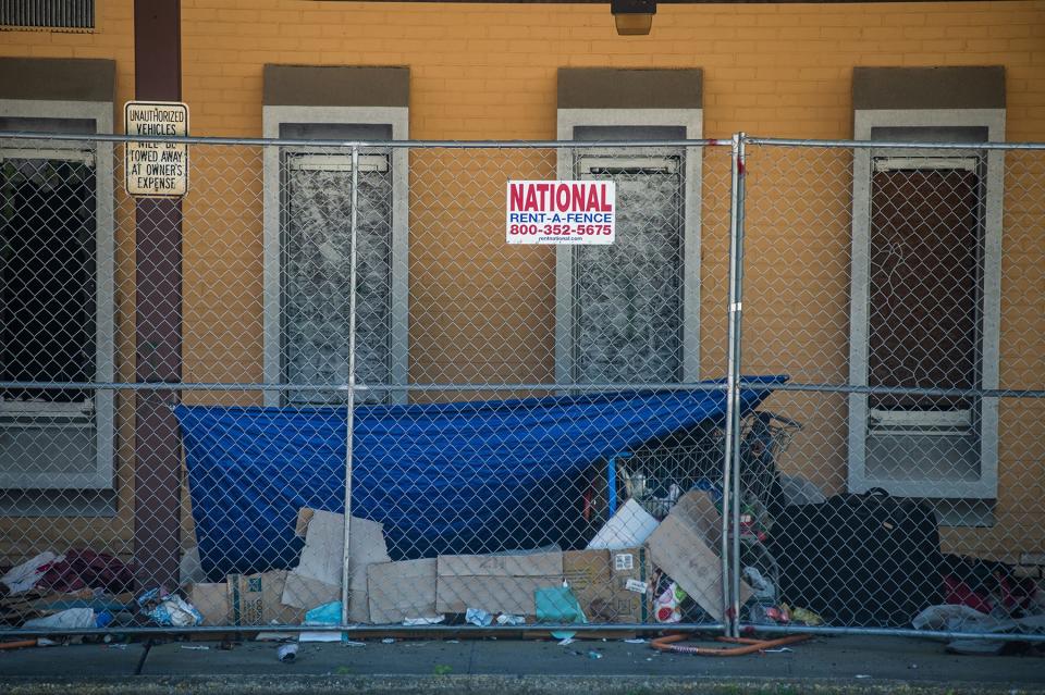 A homeless encampment is seen at the former YMCA building during a press conference for the start of demolition of the YMCA building in the city of Poughkeepsie, NY on Monday, June 6, 2022.