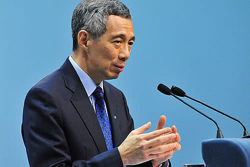 PM Lee says the government will not neglect the middle and lower income households. (Getty Images)