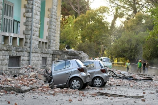 Falling debris pulverised parked cars in Tirana