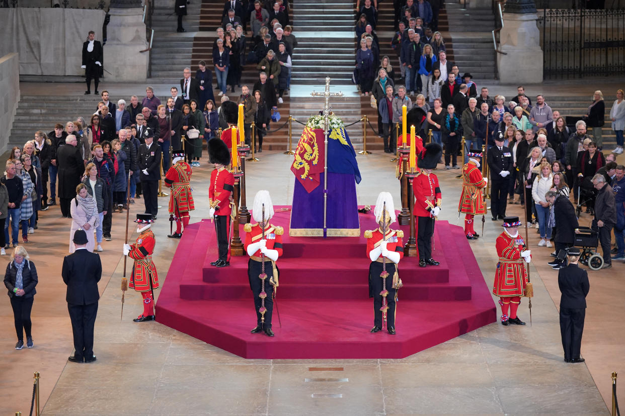 Members of the public file past the coffin of Queen Elizabeth II, in Westminster Hall, London, on 16 September 2022. 