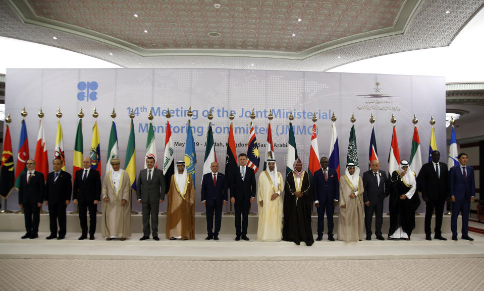 Energy ministers from OPEC and its allies pose for a group picture before they discuss prices and production cuts, in Jiddah, Saudi Arabia, Sunday, May 19, 2019. The meeting takes places as tensions flare in the Persian Gulf after the U.S. ordered bombers and an aircraft carrier to the region over an unexplained threat they perceive from Iran, which comes a year after the U.S. unilaterally pulled out of Tehran's nuclear deal with world powers and reimposed sanctions on Iranian oil. (AP Photo/Amr Nabil)