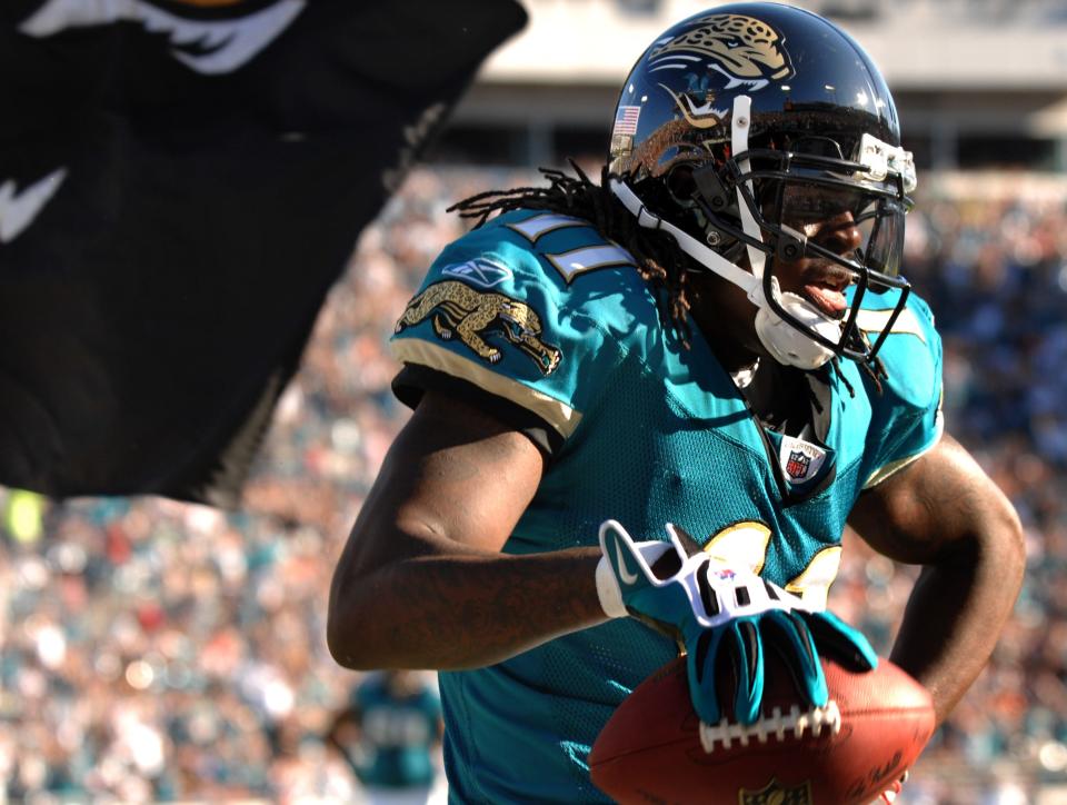 Jacksonville Jaguars receiver Reggie Williams (11) performs a dance after a 5-yard touchdown catch.