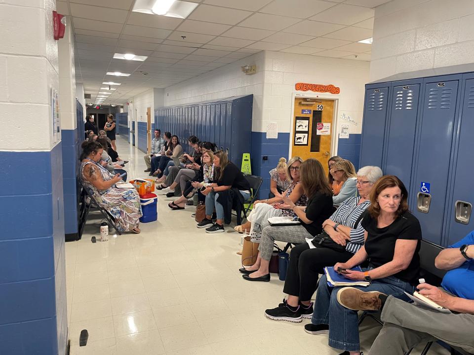 More than 40 parents, teacher and community members waited nearly three hours to voice their concerns following the School Board's decision to force principal Bryan Belanger to quit.