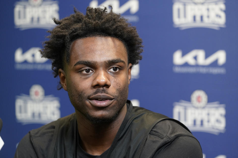 First-round draft pick Kobe Brown, selected 30th overall by the Los Angeles Clippers, speaks at a news conference in Los Angeles on Saturday, July 1, 2023. (AP Photo/Damian Dovarganes)