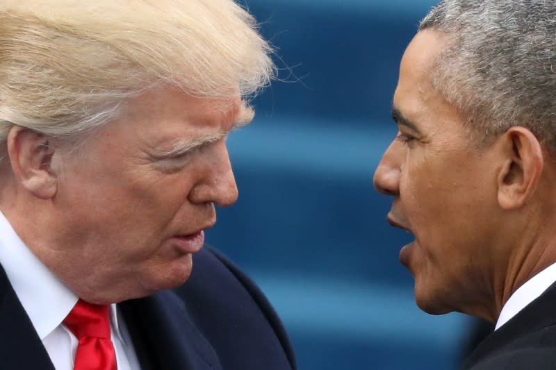 U.S. President Barack Obama (R) greets President-elect Donald Trump at inauguration ceremonies swearing in Trump as president on the West front of the U.S. Capitol in Washington, U.S., January 20, 2017. REUTERS/Carlos Barria 