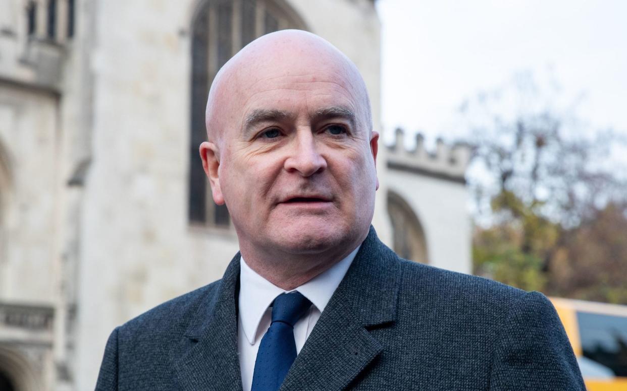 Mick Lynch, general secretary of the Rail, Maritime and Transport union (RMT), speaks to the media outside the Houses of Parliament in London. Picture date: Friday December 2, 2022. - Lucy North/PA