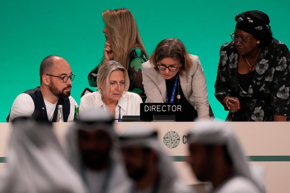 Preparations for a plenary session are made at the Cop28 UN Climate Summit, Wednesday, 13 December 2023, in Dubai, United Arab Emirates (AP)