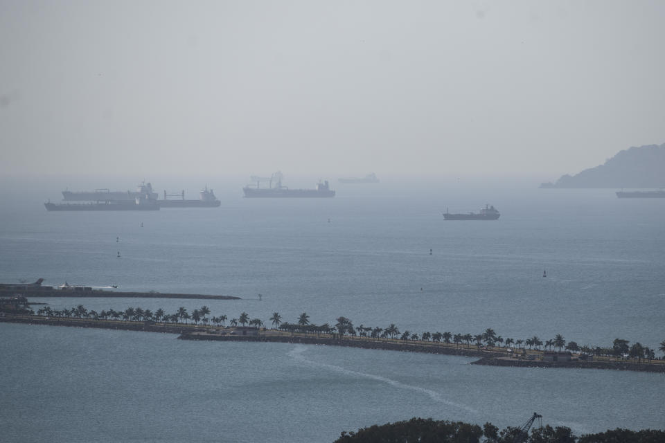 FILE - Cargo ships wait in Panama Bay for transit through the Panama Canal, in Panama City, Jan. 17, 2024. Panama Canal authorities said Monday, April 15, 2024, that as of June 1, the number of ships that will transit the waterway daily will be 32, eight more than currently allowed thanks to an improvement in water availability, but below normal times when drought did not lurk. (AP Photo/Agustin Herrera, File)