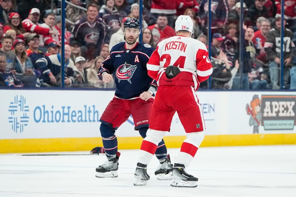 Oct 16, 2023; Columbus, Ohio, USA; Columbus Blue Jackets defenseman Erik Gudbranson (44) squares up with Detroit Red Wings center Klim Kostin (24) for a fight during the third period of the NHL hockey game at Nationwide Arena. The Blue Jackets lost 4-0.