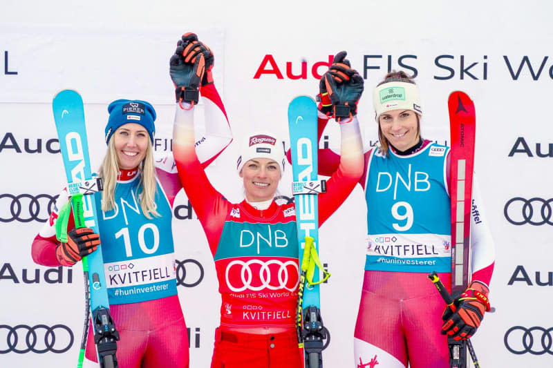 (L-R) Austria's second-placed Cornelia Huetter, Switzerland's first-placed Lara Gut-Behrami, and Austria's third-placed Mirjam Puchner celebrate on the podium after the Women's downhill and super-G at the Ski Alpine World Cup in Kvitfjell. Erik Flaaris Johansen/NTB/dpa