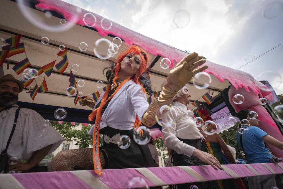 People participate in a gay pride parade in Turin, Italy on Saturday, June 15, 2024. (Matteo Secci/LaPresse via AP)