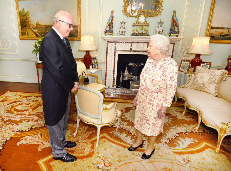 The Queen has already replaced this photo of Meghan Markle and Prince Harry at Buckingham Palace. Photo: Getty Images