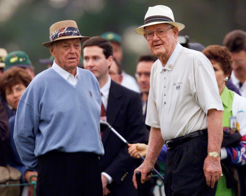 FILE PHOTO: Golf legends Byron Nelson (R) and Sam Snead are introduced to the crowd