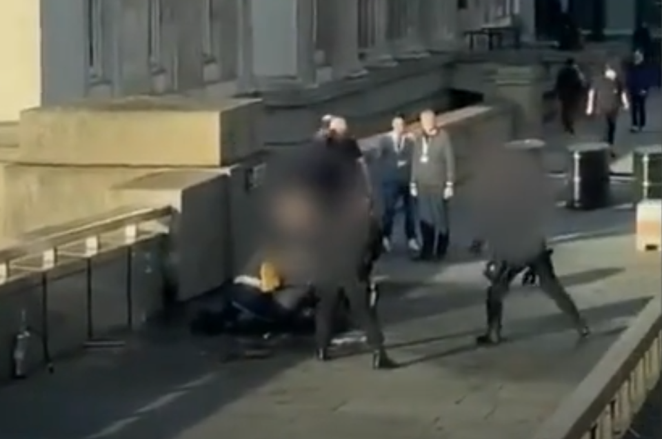 Footage shows a man pinned down by police shortly before he appeared to be shot. Photo: Twitter / @HBOBlog