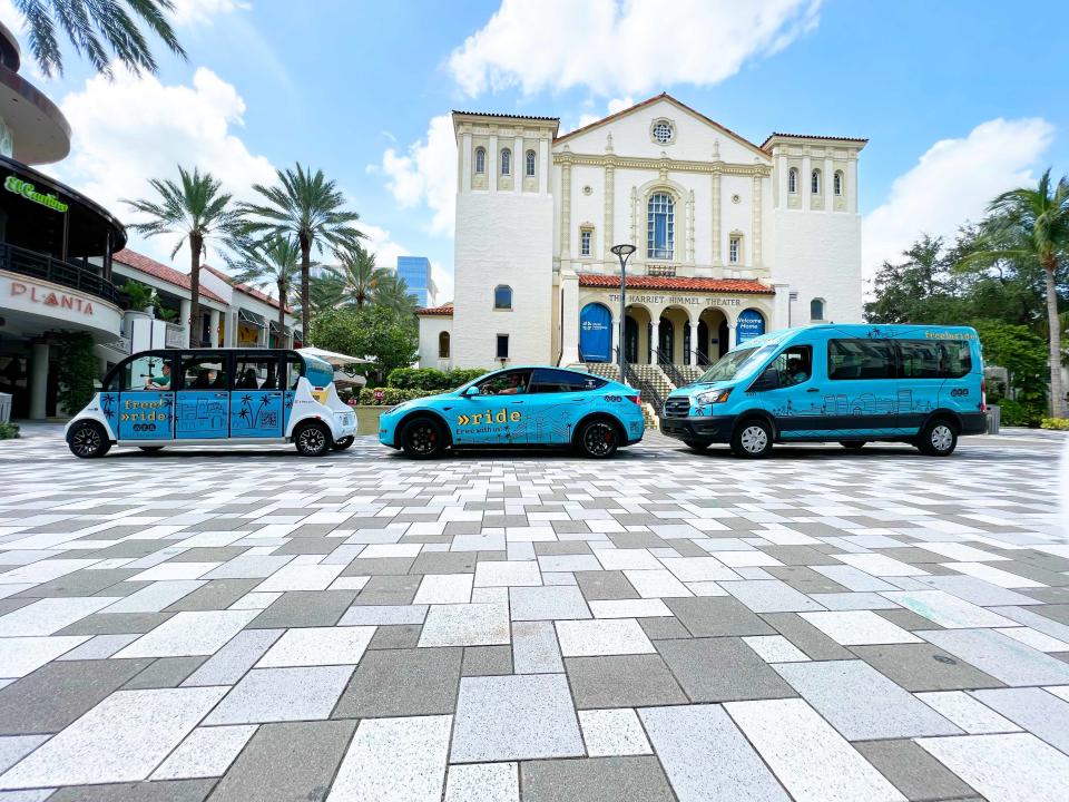 Electric vehicles offering free rides within downtown West Palm Beach.