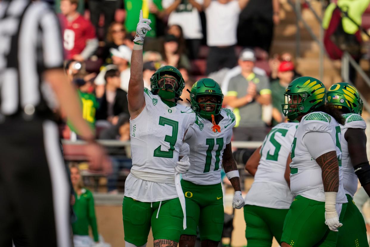 Oregon tight end Terrance Ferguson celebrates after scoring a receiving touchdown against Stanford during the second half of the game Saturday, Sept. 30, 2023, in Stanford, California.