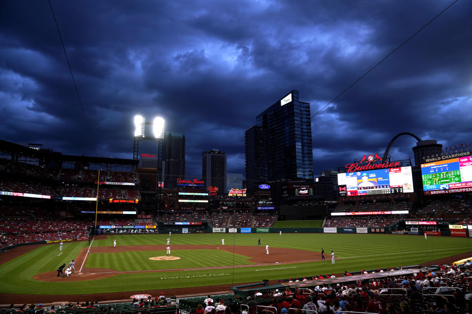 Clouds hang over Busch Stadium as the St. Louis Cardinals play the New York Mets during the third inning of a baseball game Monday, May 3, 2021, in St. Louis. (AP Photo/Jeff Roberson)