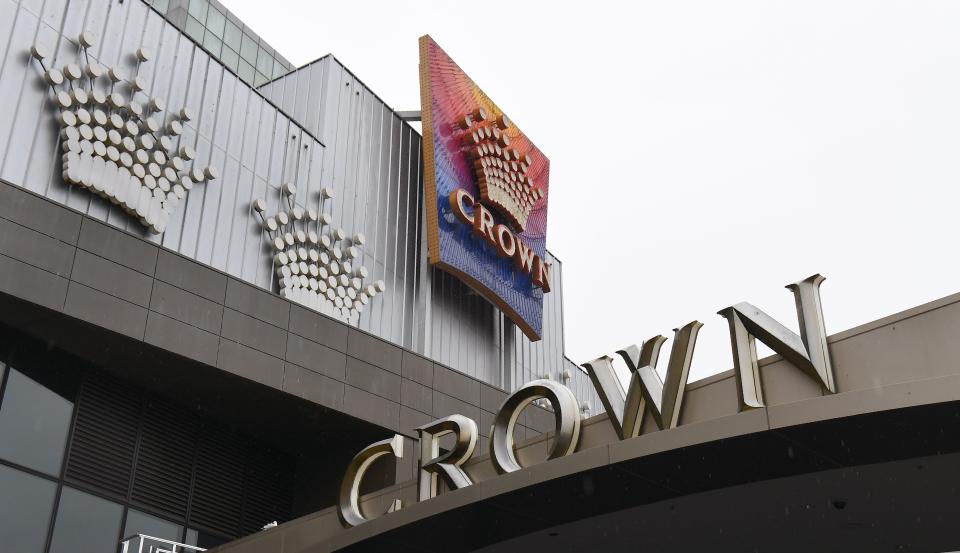 The lights are turned off on Crown Casino signage in Melbourne on August 19, 2020 as its parent company Crown Resorts recorded a full-year net profit fall of 80 percent due to a COVID-19 coronavirus forced closure. (Photo by William WEST / AFP) (Photo by WILLIAM WEST/AFP via Getty Images)