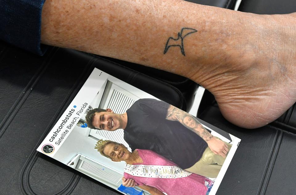 Last April, for her birthday, Judi Batchelor got a small bird tattoo on her lower leg in honor of a loved one. She plans to get more for her 85th birthday in April. She used Cash Combs Studio in the Sea Park Plaza in Satellite Beach. Cash Combs, seen in this photo with her, will add the new ones.