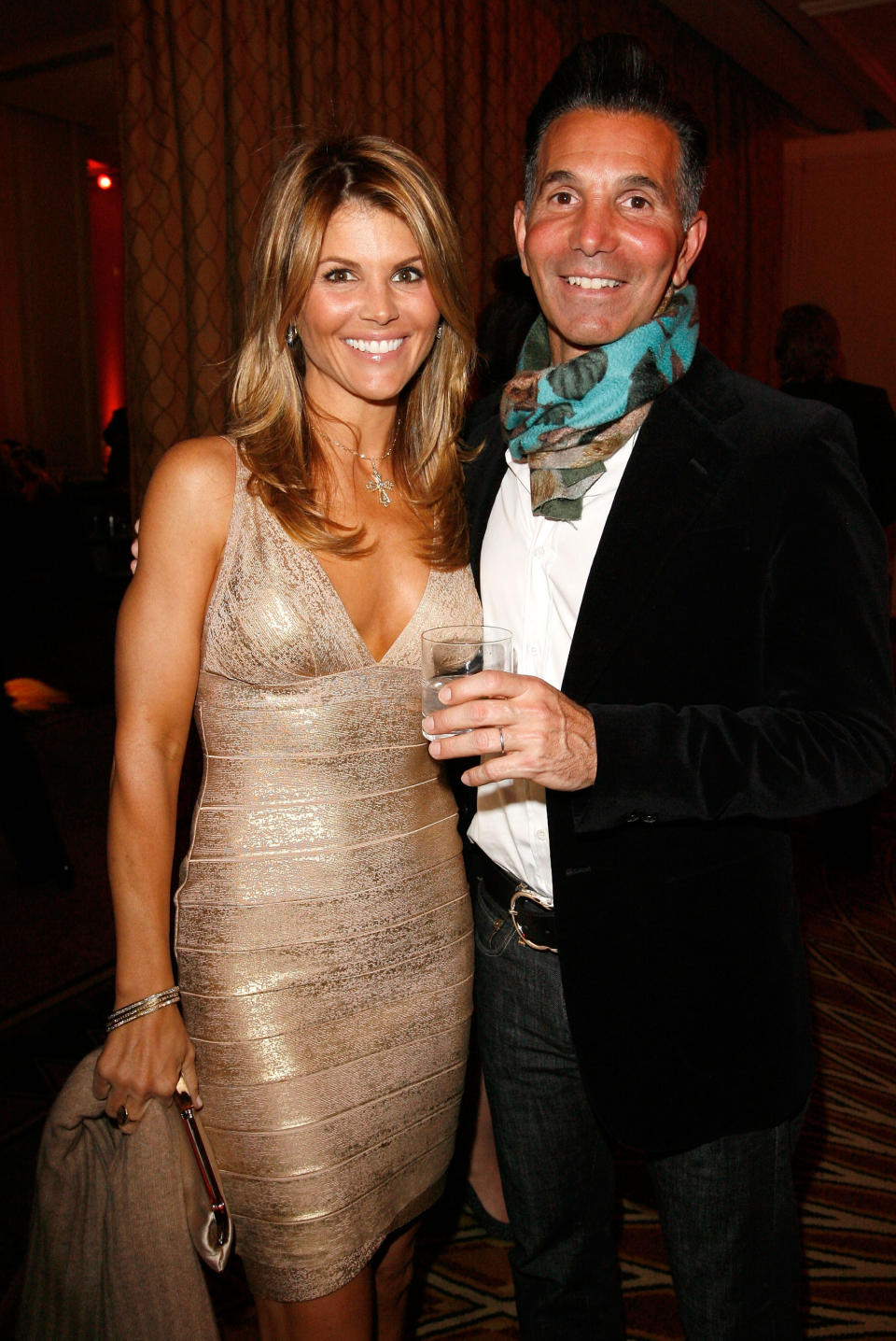 BEVERLY HILLS, CA - FEBRUARY 20:  Actress Lori Loughlin (L) and husband Mossimo Giannulli attend the Saks Fifth Avenue's Unforgettable Evening cocktail reception benefiting Entertainment Industry Foundation's (EIF) Women's Cancer Research Fund held at the Beverly Wishire Hotel on February 20, 2008 in Beverly Hills, California.  (Photo by Donato Sardella/WireImage) 