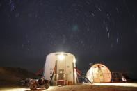 �A view of the night sky above the Mars Desert Research Station (MDRS) is seen outside Hanksville in the Utah desert March 2, 2013. The MDRS aims to investigate the possibility of a human exploration of Mars and takes advantage of the Utah desert's Mars-like terrain to simulate working conditions on the red planet. Scientists, students and enthusiasts work together to develop field tactics and study the terrain while wearing simulated spacesuits and carrying air supply packs. They live together in a small communication base with limited space and supplies. Picture taken March 2, 2013. REUTERS/Jim Urquhart