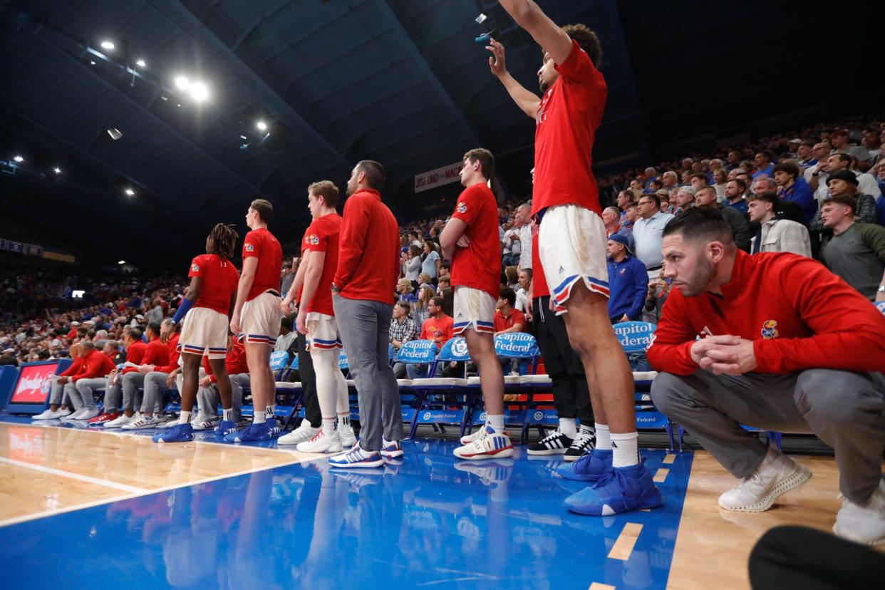The Kansas bench watches with intensely in the second half of Friday's game against Yale. The Jayhawks beat the Bulldogs 75-60 in Allen Fieldhouse on Friday night.