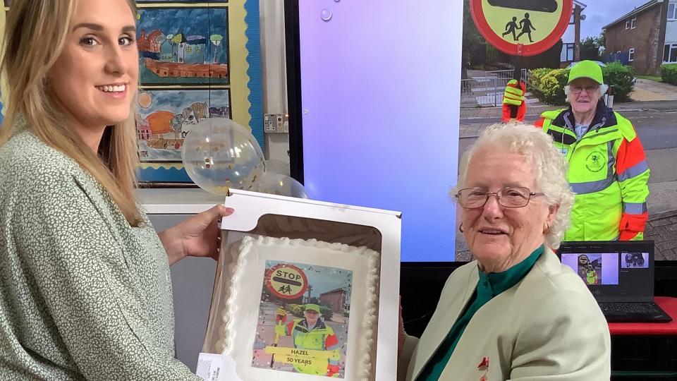 Lucy O'Leary with Hazel Davies and the cake