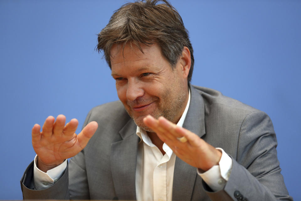 Robert Habeck, chairman of the Green Party, gestures during a news conference after the elections for the European Parliament in Berlin, Germany, Monday, May 27, 2019. (AP Photo/Matthias Schrader)