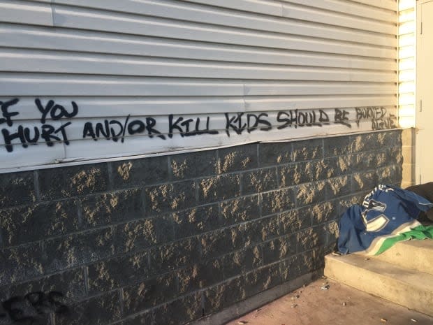 Graffiti on the All Saints Ukrainian Orthodox Church in Kamloops, B.C., found on Thursday' (Jennifer Chrumka/CBC - image credit)