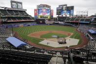 A mostly empty stadium is seen before the Opening Day baseball game between the Mets and the Atlanta Braves at Citi Field, Friday, July 24, 2020, in New York. (AP Photo/Seth Wenig)