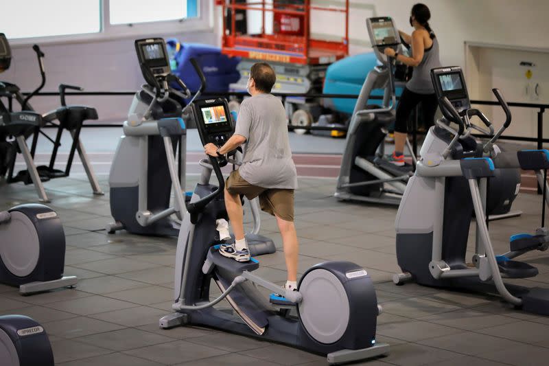 Members exercise at Chelsea Piers Fitness, Manhattan's largest fitness facility on first day of re-opening of gyms in New York