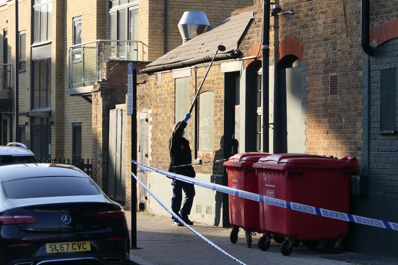 Police searching the gutters of The Duke