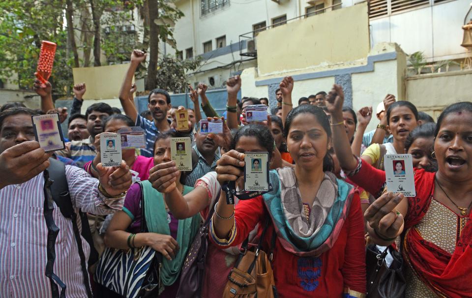 MUMBAI, INDIA - FEBRUARY 23: Factory workers of Gitanjali Jewellers protest outside factory at Marol, on February 23, 2018 in Mumbai, India. More than 500 workers at Gili India factories in Marol Co-Operative Industrial Estate of Andheri East had a standoff with the management on Friday after they were allegedly asked to resign. The work at the factories has come to standstill since the 11,400 crore Punjab National Bank scam, allegedly involving the owner billionaire Nirav Modi and his uncle Mehul Choksi. (Photo by Satyabrata Tripathy/Hindustan Times via Getty Images)