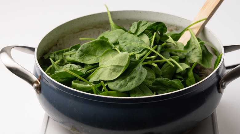 spinach wilting in a pan