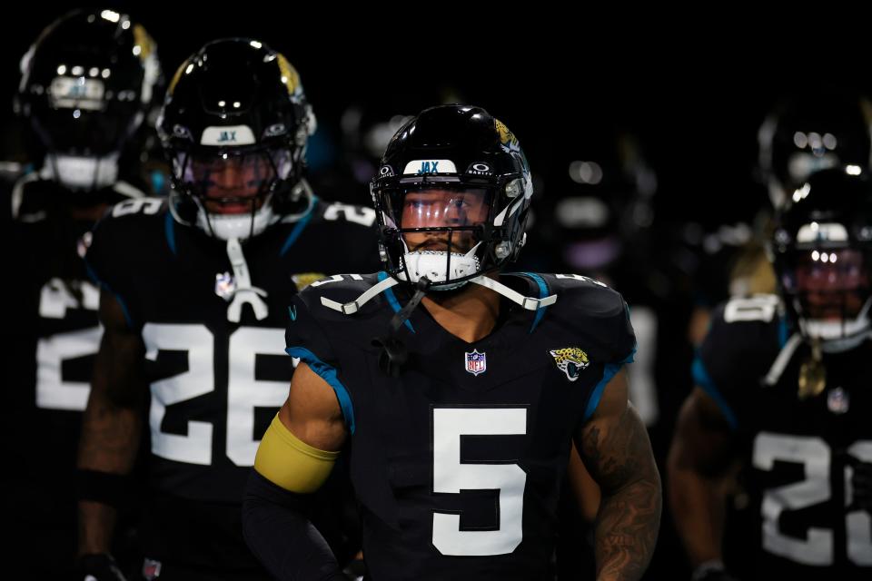 Jacksonville Jaguars safety Andre Cisco (5) runs onto the field before a regular season NFL football matchup Monday, Dec. 4, 2023 at EverBank Stadium in Jacksonville, Fla. The Cincinnati Bengals defeated the Jacksonville Jaguars 34-31 in overtime. [Corey Perrine/Florida Times-Union]