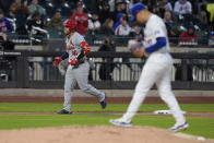 St. Louis Cardinals' Willson Contreras (40) heads for home after hitting a home run off New York Mets pitcher José Buttó during the third inning of a baseball game, Friday, April 26, 2024, in New York. (AP Photo/Frank Franklin II)