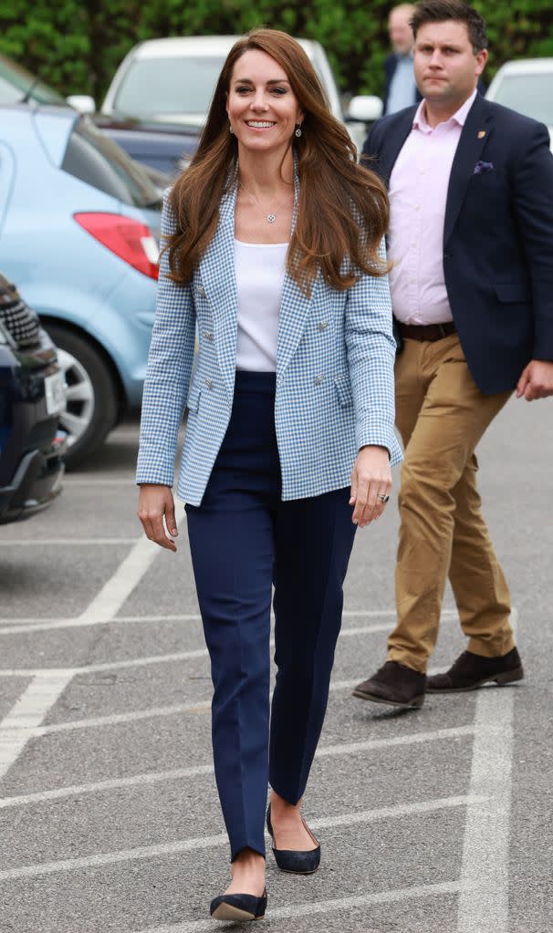 A colourful blazer and cigarette trousers is her current go-to