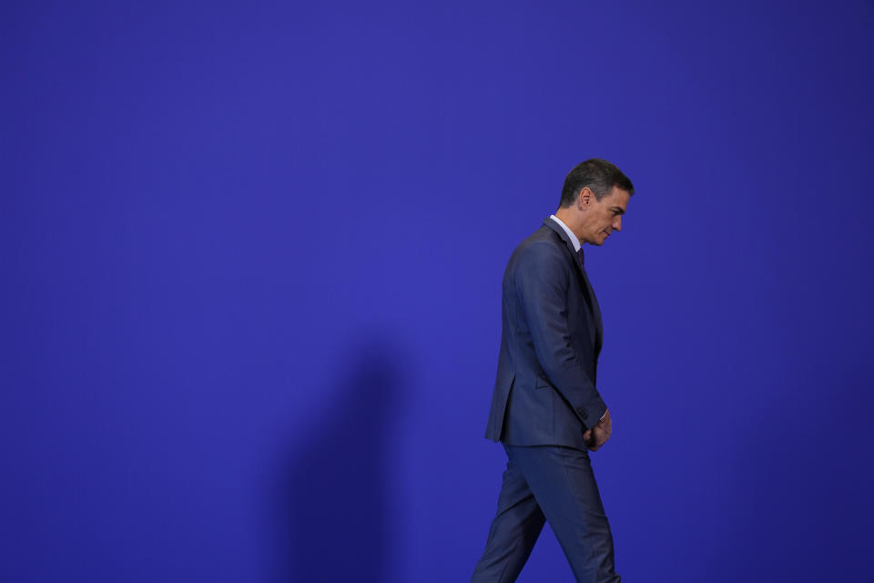 FILE - Spain's Prime Minister Pedro Sanchez walks at the Europe Summit in Granada, Spain, Oct. 6, 2023. Socialist Prime Minister Pedro Sanchez has left Spain in suspense on announcing he may step down because of what he called an "unprecedented" smear campaign against his wife. Sanchez, who has been in office since 2018, stunned all Wednesday April 24, 2024 by announcing that he was canceling all events until next week when he will unveil his future. (AP Photo/Manu Fernandez, File)