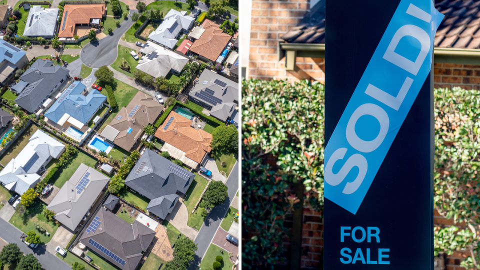 Australian houses aerial view. Sold sign on house. Home loan concept.