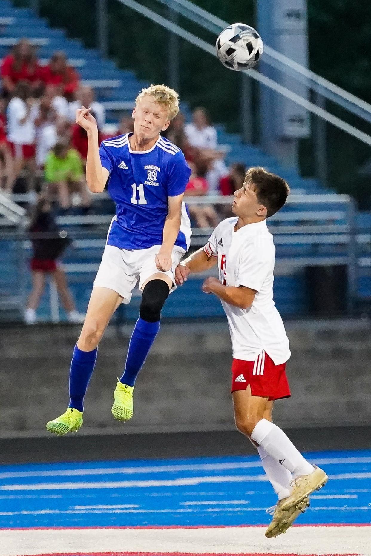 Ravenna's Mason Ward, left, goes up to win a ball in the air August 31, 2021.