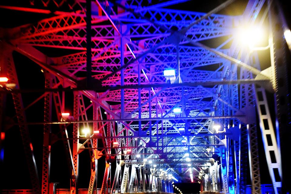 The Texas Street Bridge is lit up during a test of the bridge's new LED lights Tuesday evening, January 25, 2022.