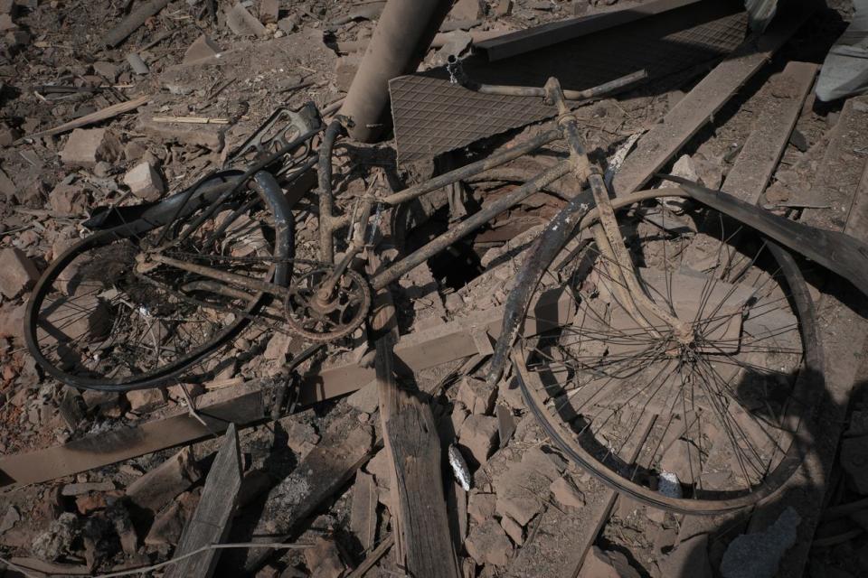 A bicyle destroyed by a Russian bomb in Vovchansk, Kharkiv Oblast, on May 11, 2024. (Francis Farrell/The Kyiv Independent)