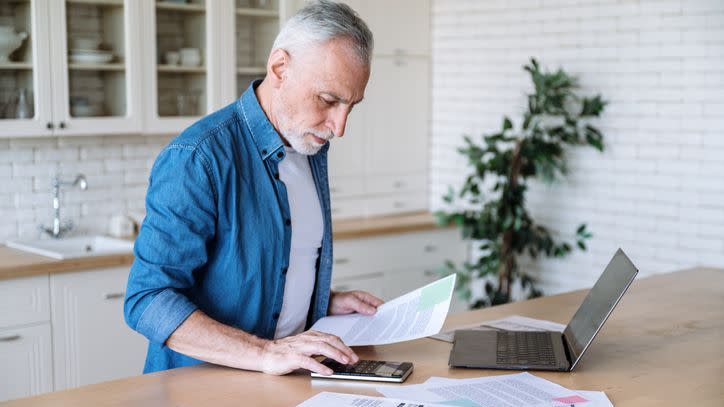 A 60-year-old man who's going through a divorce looks over his finances to determine whether he can retire in five years.