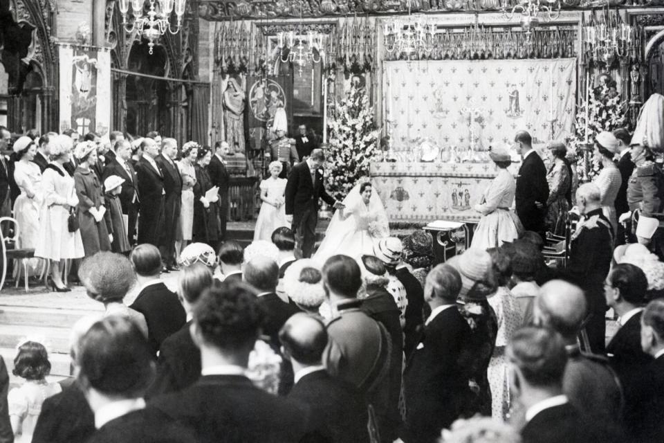 It was Princess Margaret's big day, but she still curtsied for her sister at her Westminister Abbey wedding.