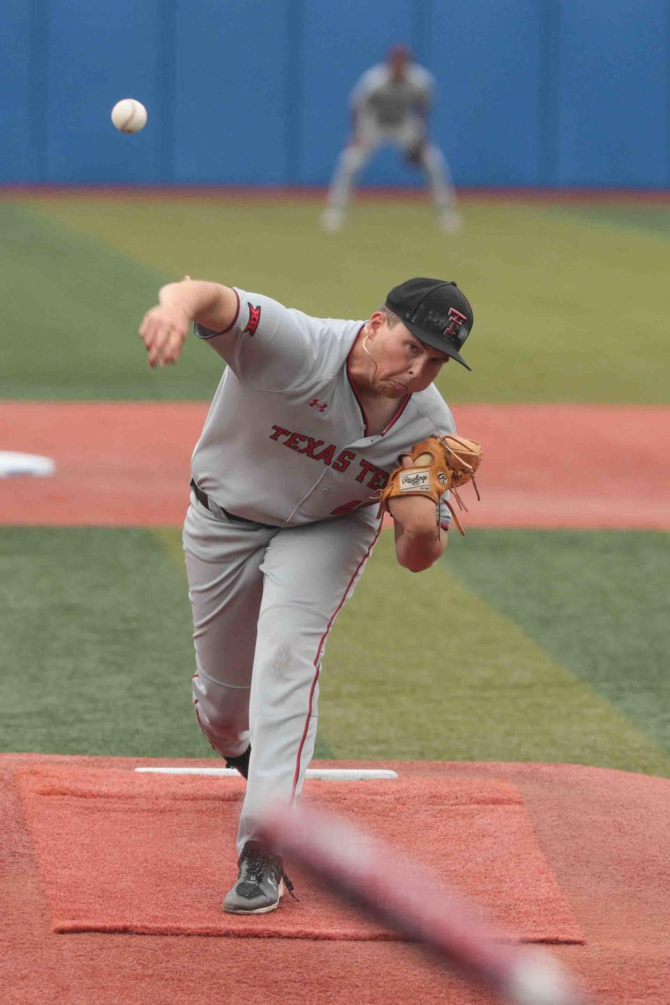 Texas Tech freshman Mac Heuer delivers a pitch in the third inning of a game Sunday against Kansas at Hoglund Ballpark in Lawrence, Kansas. Heuer walked five batters in the fourth inning, was charged with six runs in 3 2/3 and took the loss in a 7-3 setback.