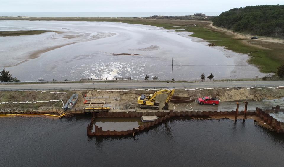 View looking west towards Cape Cod Bay as the Herring River tidal restoration project is well underway. Once complete the project will revive over 1,000 acres of tidal salt marsh. Chequessett Neck Road is in the center of the image. Rich Waldo, who is resigning as town administrator in Wellfleet, listed the project as one his accomplishments during tenure. He is leaving to become director of public works in Orleans.