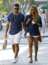 <p>Russell Wilson and Ciara stepped out in matching casual looks in West Hollywood on March 11. (Photo: FameFlynet) </p>